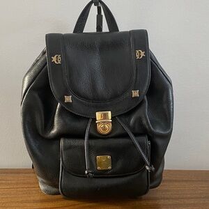 Vintage MCM Black Pebbled Leather Backpack With Gold-Tone Hardware